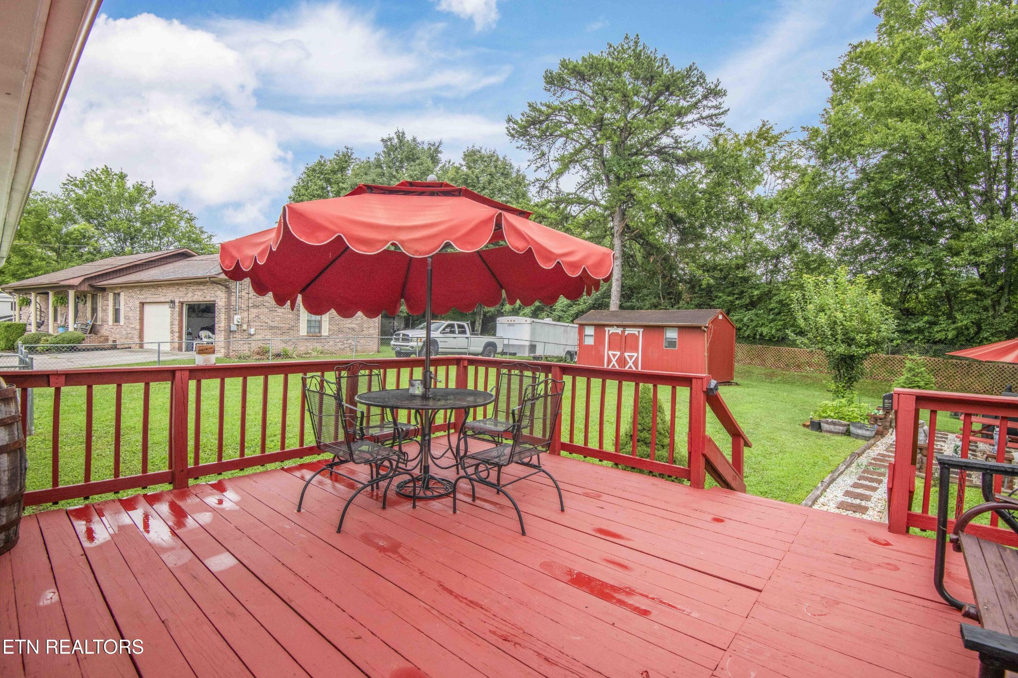 2206 Rambling Road Knoxville, TN 37912 - Photo 15 of 47 a view of deck with patio