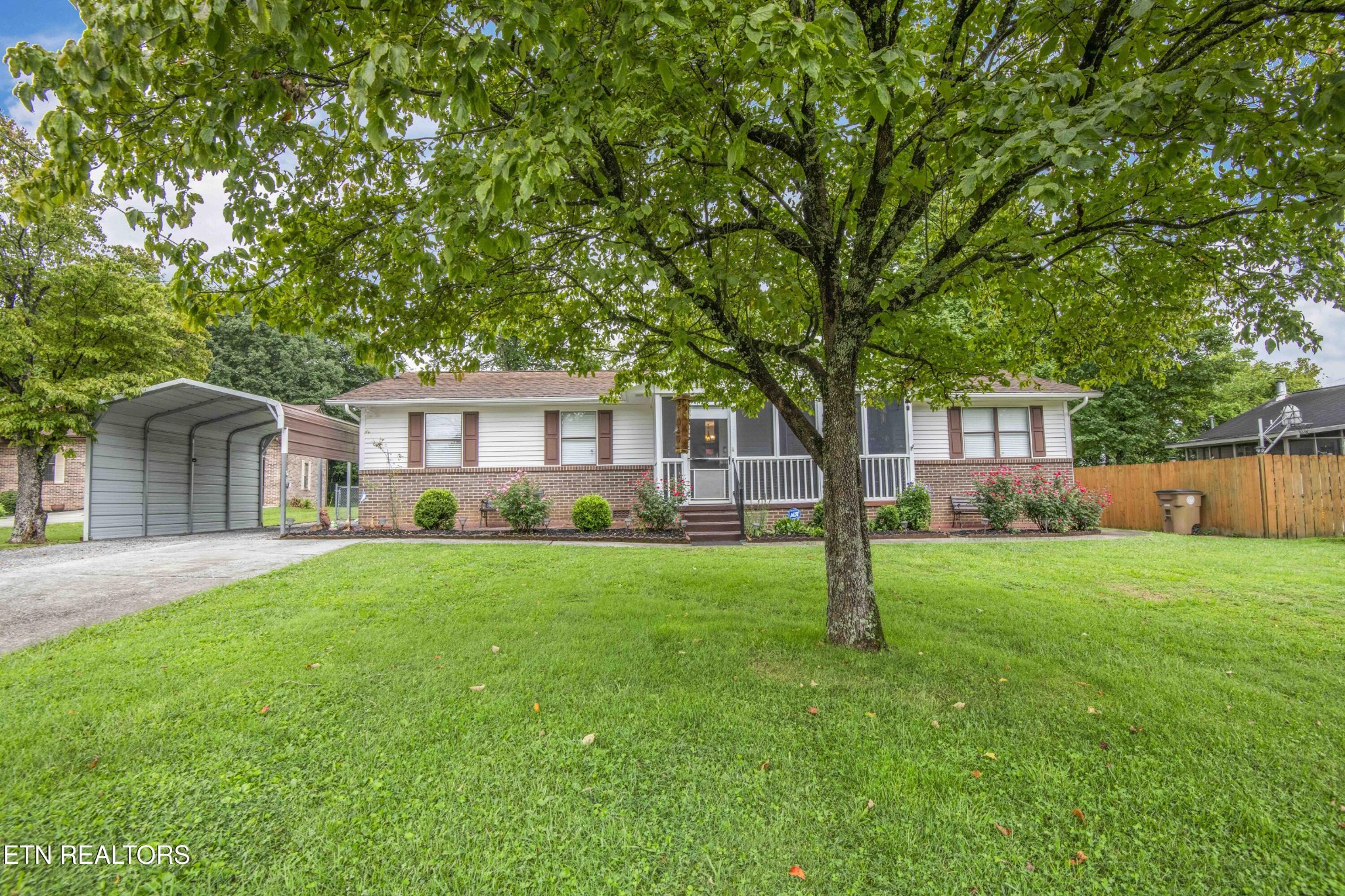 2206 Rambling Road Knoxville, TN 37912 - Photo 26 of 47 a front view of house with yard and green space