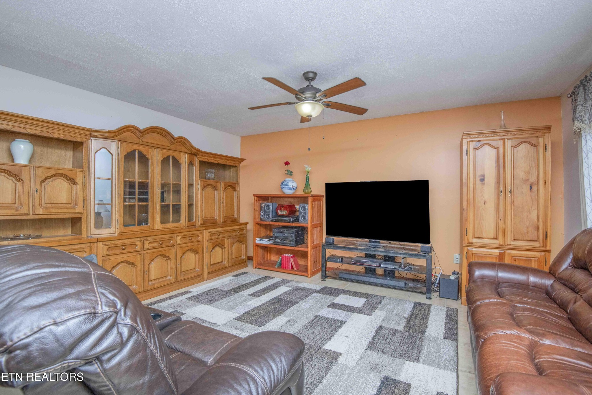 2206 Rambling Road Knoxville, TN 37912 - Photo 3 of 47 a living room with furniture and a flat screen tv