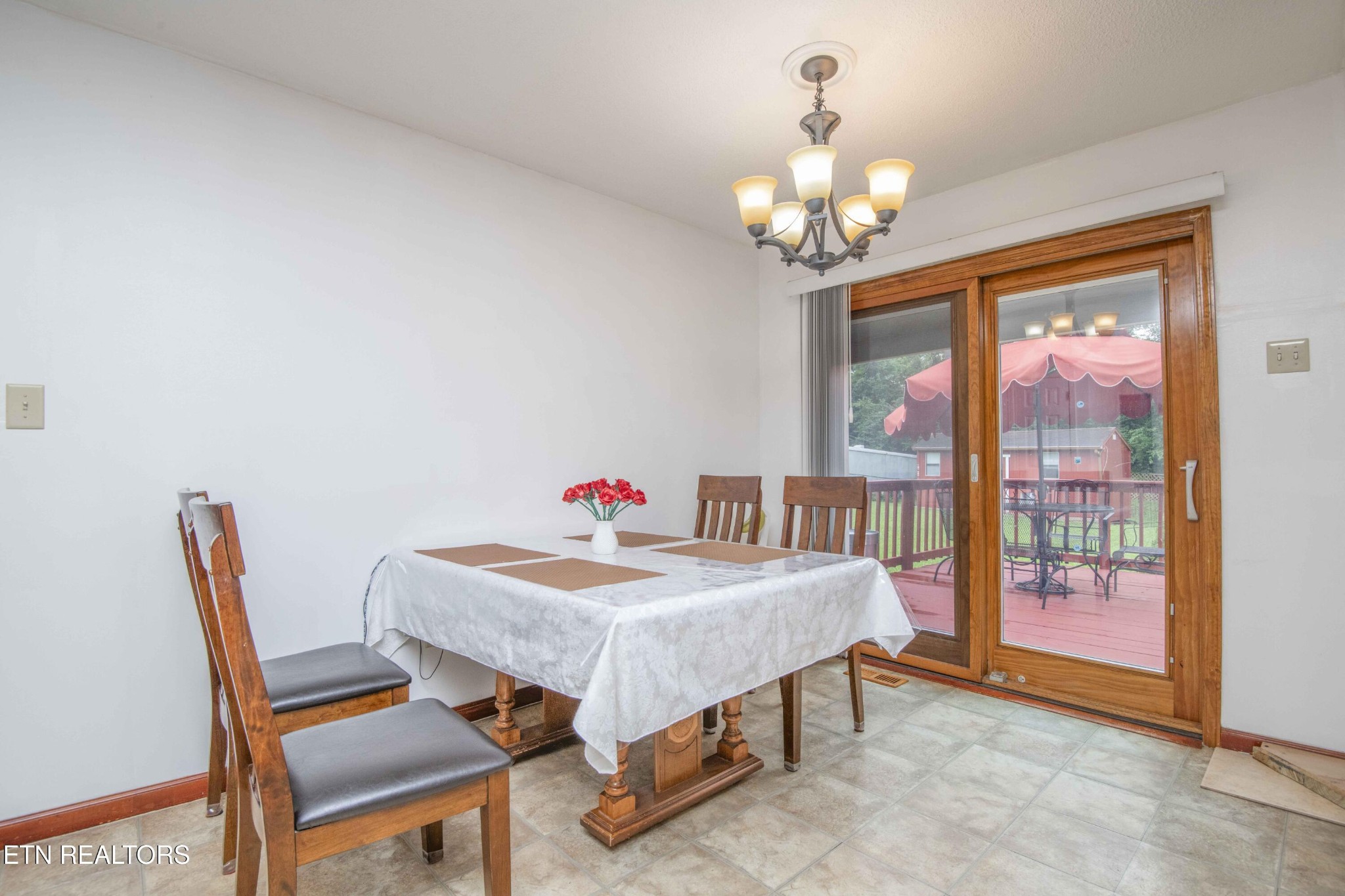 2206 Rambling Road Knoxville, TN 37912 - Photo 33 of 47 a dining room with a table and chairs