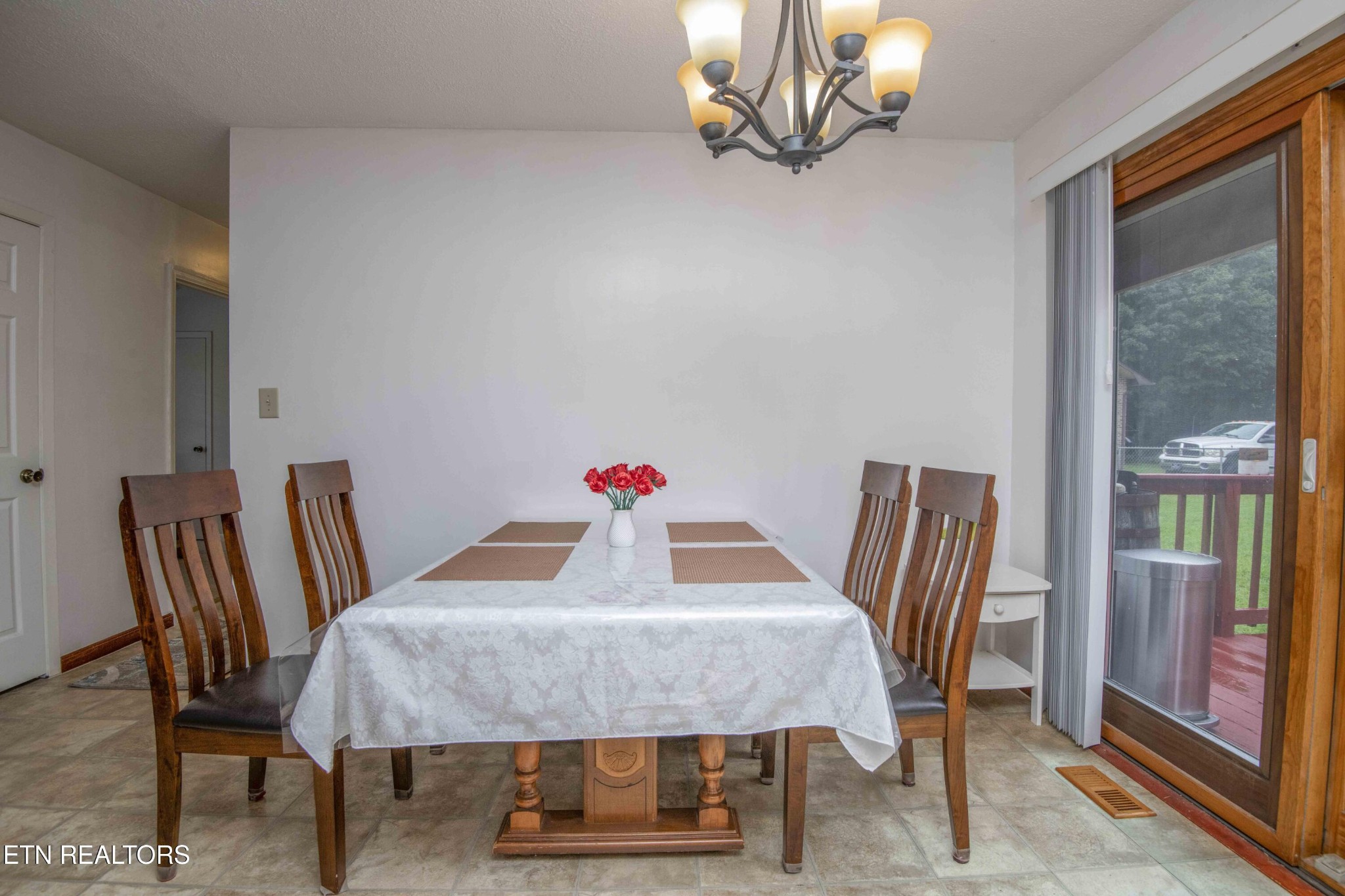 2206 Rambling Road Knoxville, TN 37912 - Photo 5 of 47 a view of a dining room with furniture window and outside view