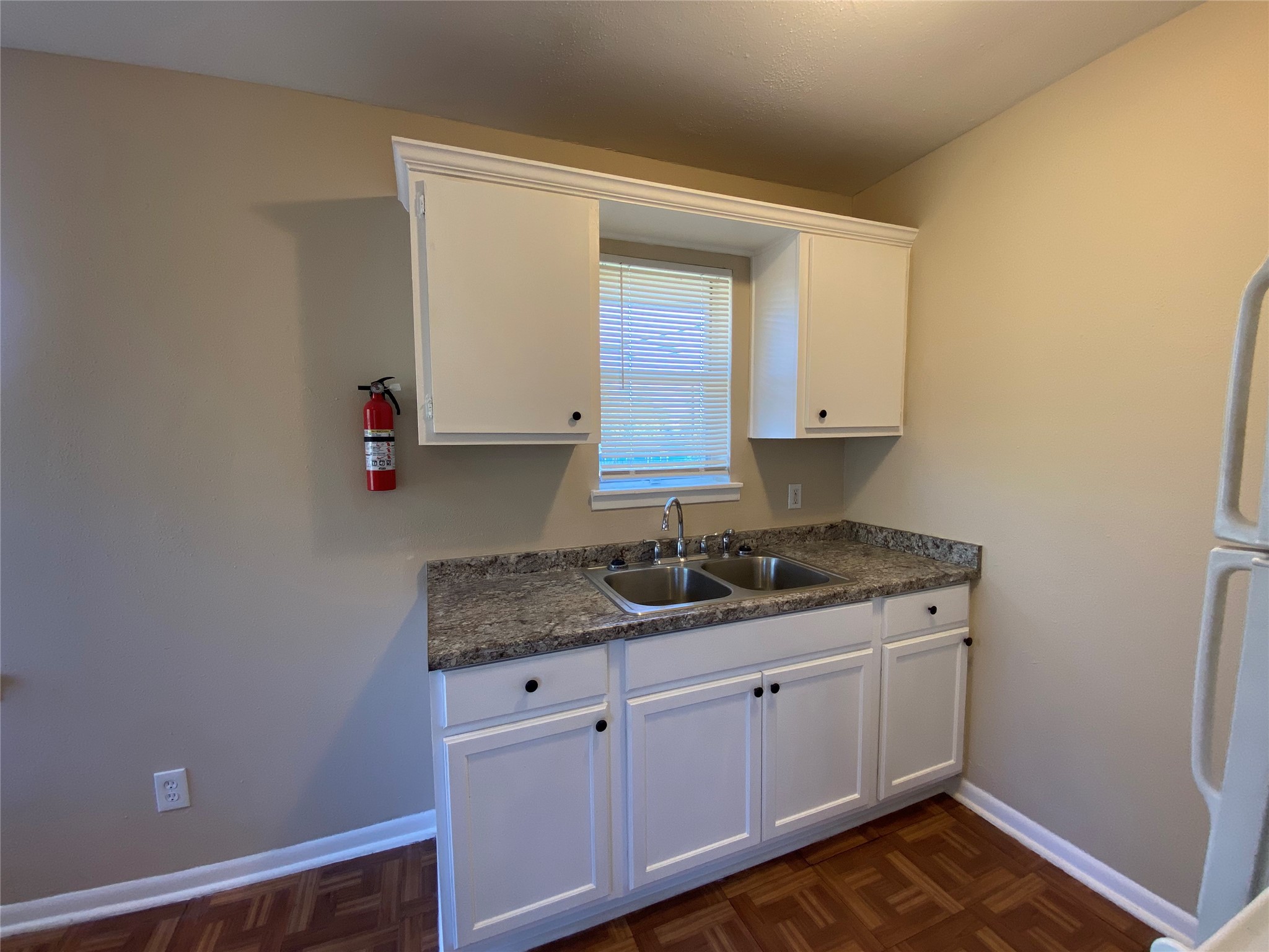 3024 Elgin Street, Unit 8 Houston, TX 77004 - Photo 3 of 11 a kitchen with a sink and cabinets