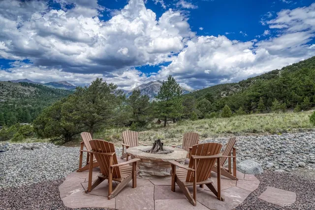 a view of a lounge chairs in the patio