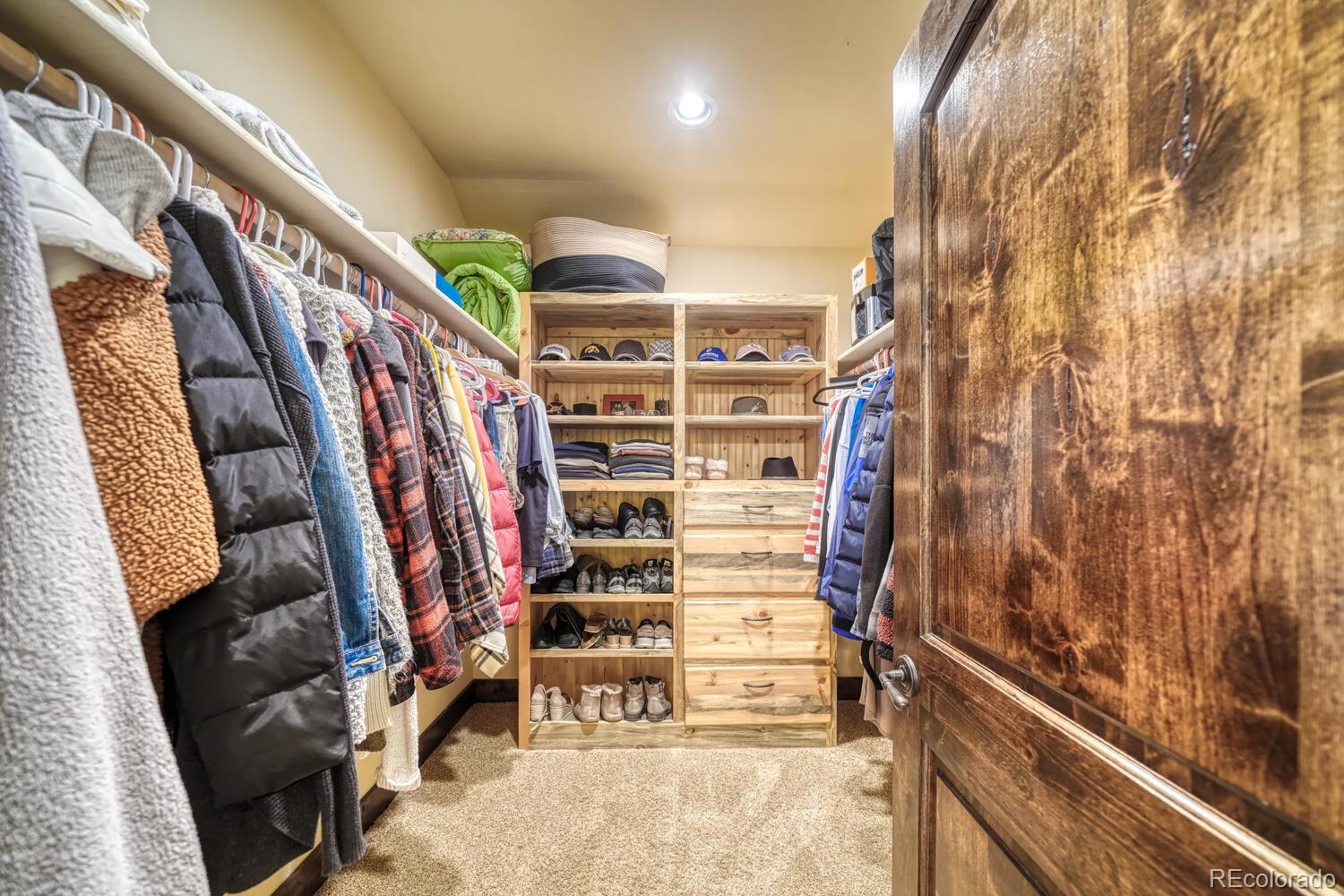 8966 Hanging Tree Drive Salida, CO 81201 - Photo 31 of 50 a view of walk in closet with clothes and shoes
