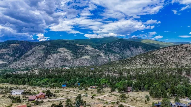 a view of a field of mountains