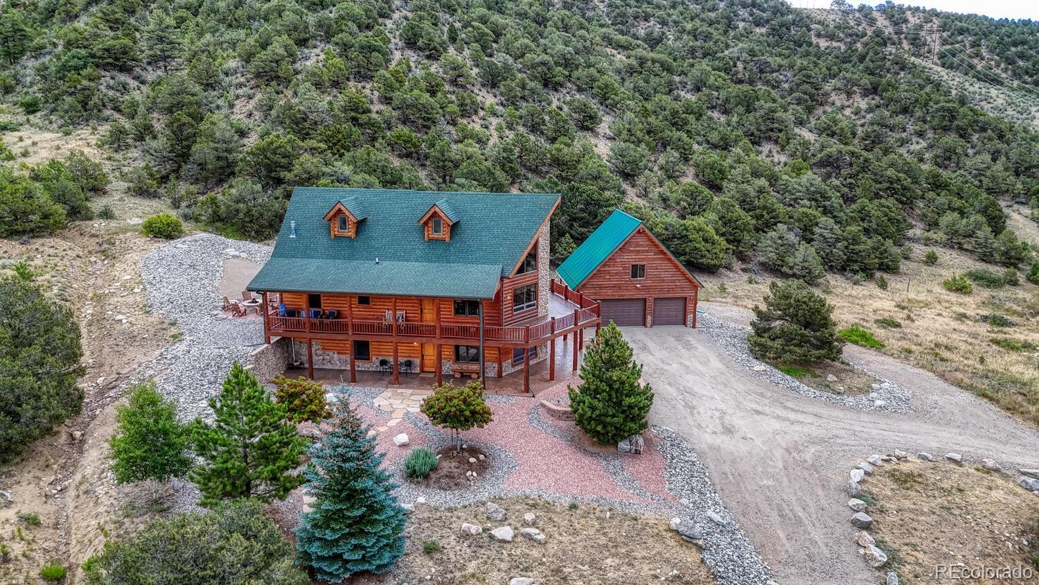 8966 Hanging Tree Drive Salida, CO 81201 - Photo 49 of 50 an aerial view of a house with swimming pool
