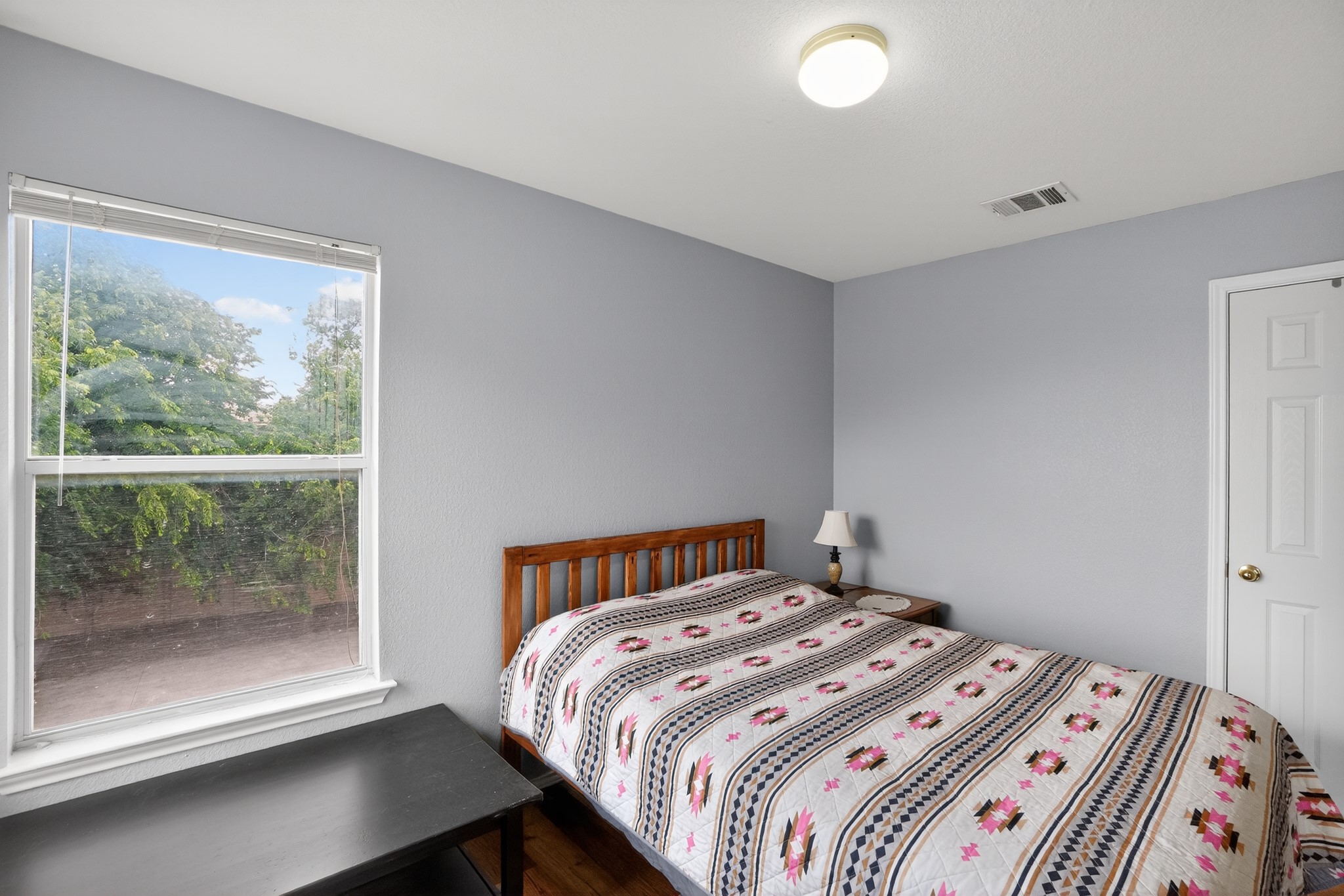 13808 Harris Ridge Boulevard Pflugerville, TX 78660 - Photo 22 of 40 a bedroom with a bed and a window