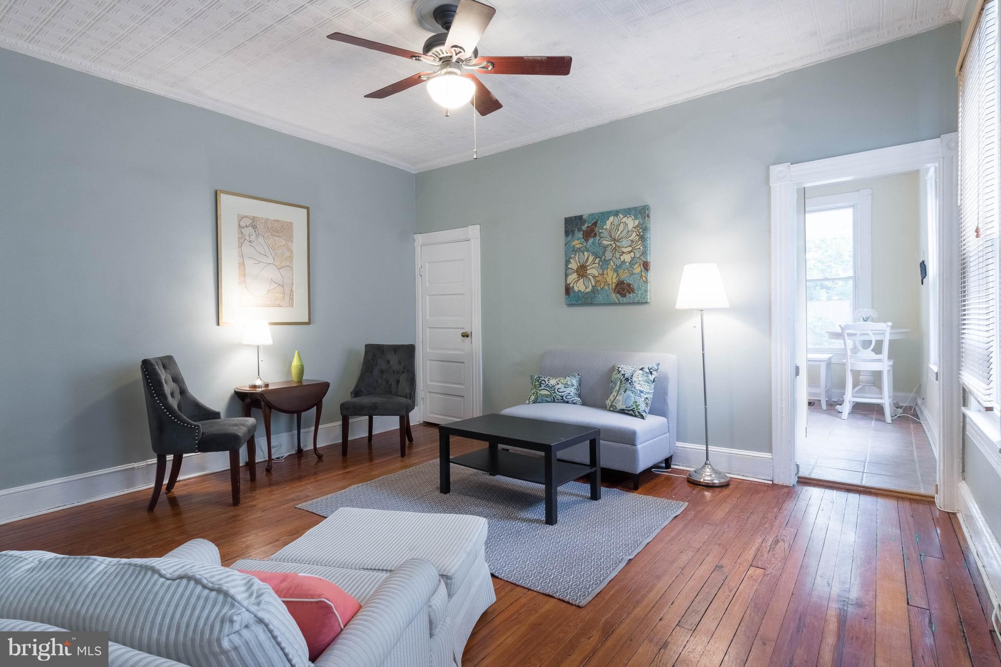 4524 Keswick Road Baltimore, MD 21210 - Photo 6 of 22 Spacious Living Room leading to kithen