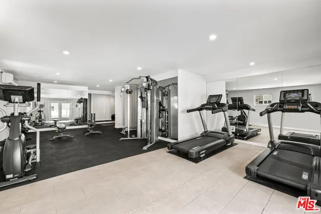 a view of a room with gym equipment