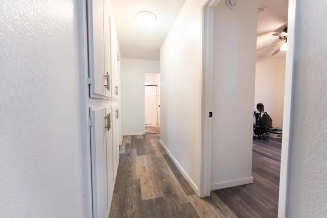 a view of a bathroom from a hallway