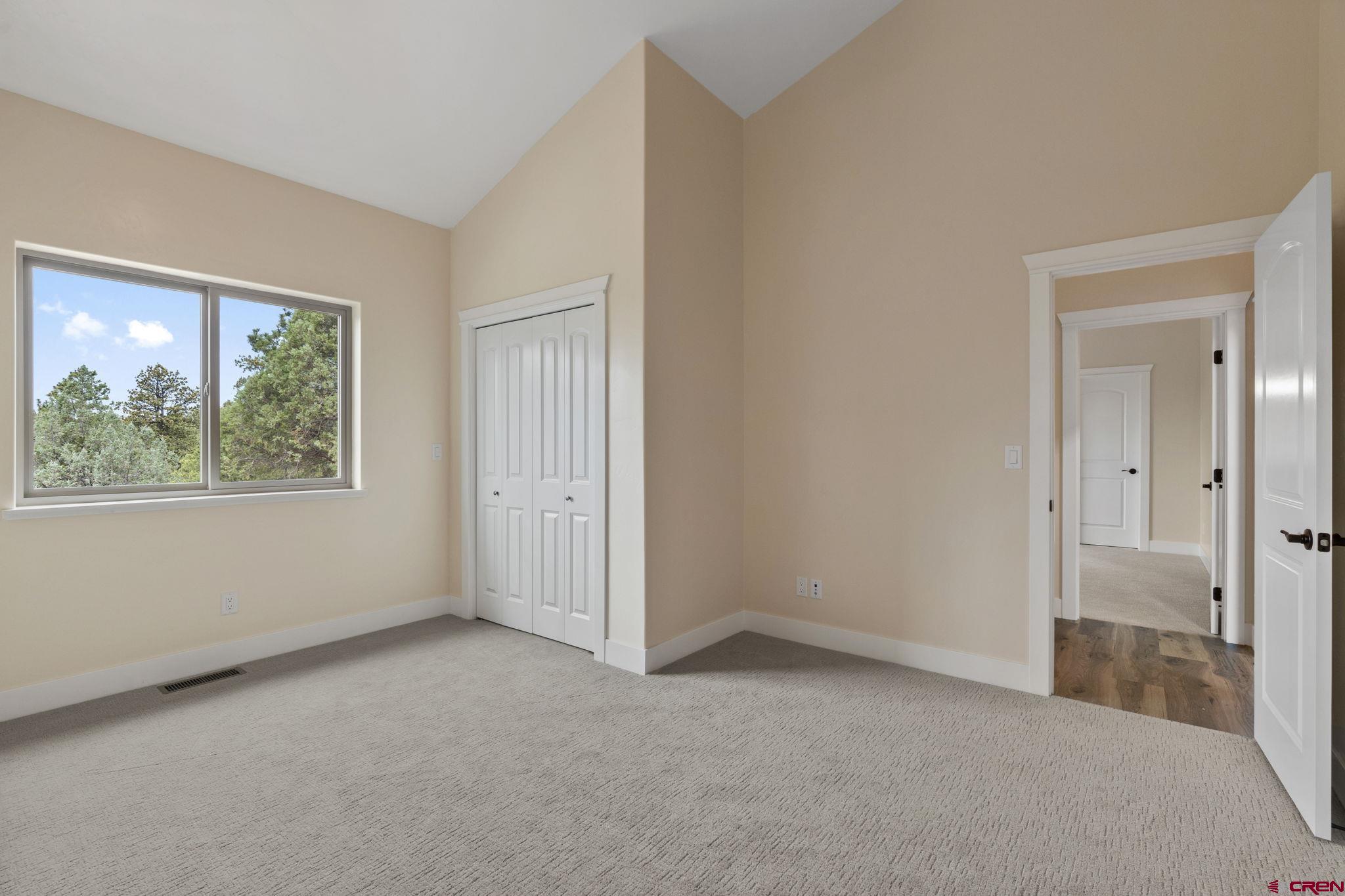 640 Sawmill Road Durango, CO 81303 - Photo 26 of 42 an empty room with windows and closet