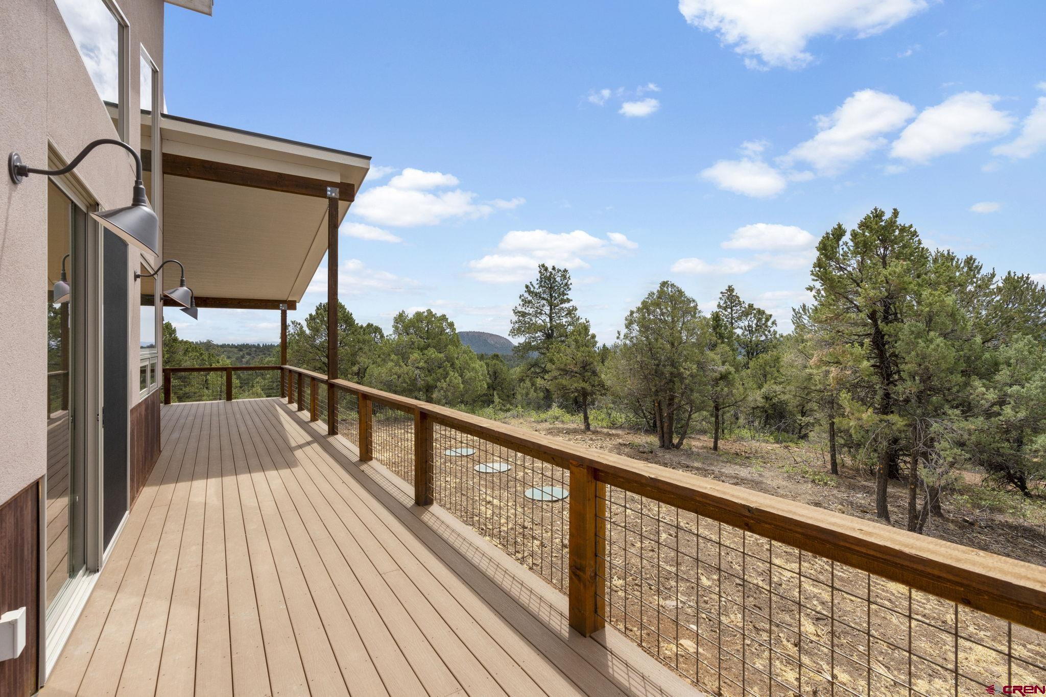 640 Sawmill Road Durango, CO 81303 - Photo 36 of 42 a view of a balcony with wooden floor
