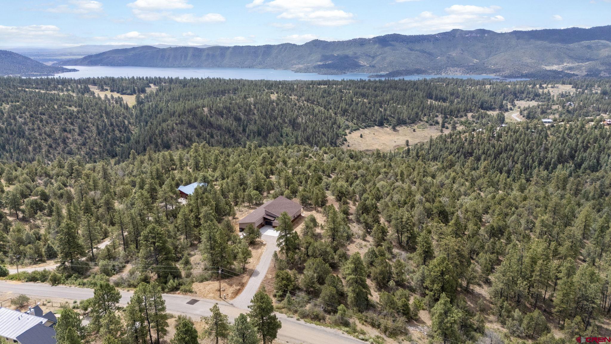 640 Sawmill Road Durango, CO 81303 - Photo 6 of 42 a view of a town with mountains in the background