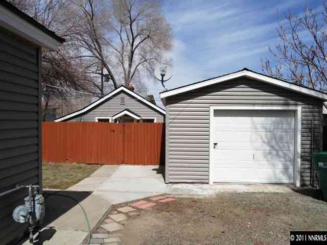 727 Roberts Street Reno, NV 89502 - Photo 2 of 11 a front view of a house with a yard