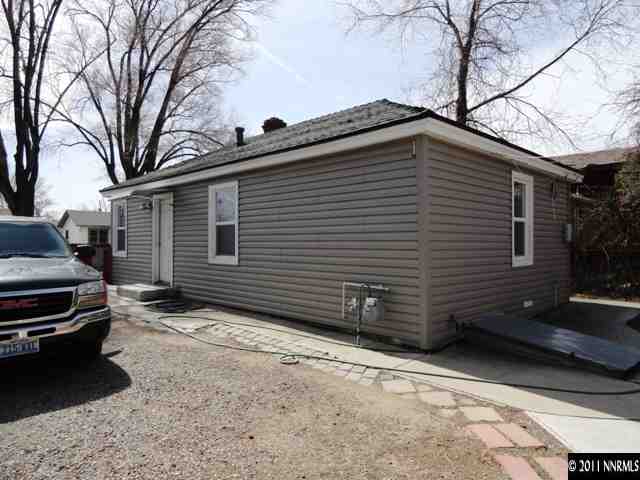 727 Roberts Street Reno, NV 89502 - Photo 7 of 11 a side view of a house