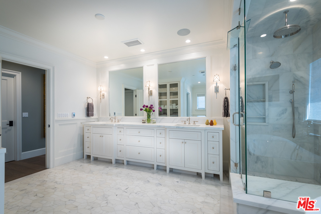 222 20th Street Santa Monica, CA 90402 - Photo 22 of 44 a bathroom with a double vanity sink mirror and shower