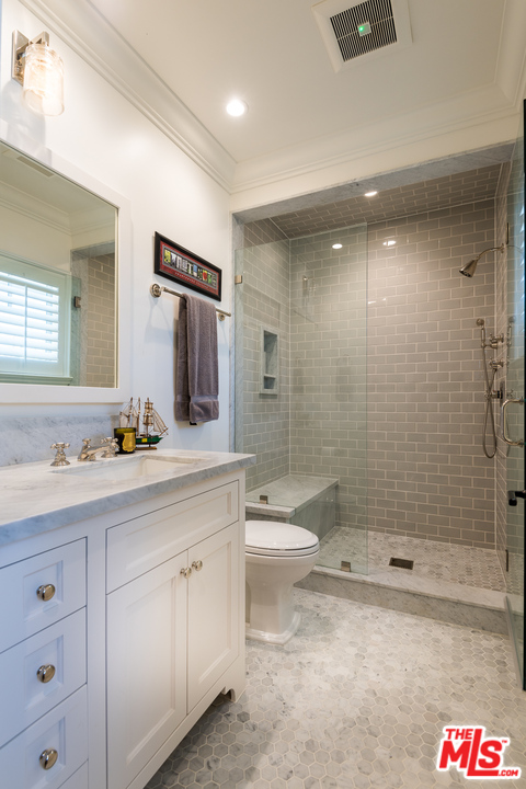 222 20th Street Santa Monica, CA 90402 - Photo 34 of 44 a bathroom with a sink a toilet and shower