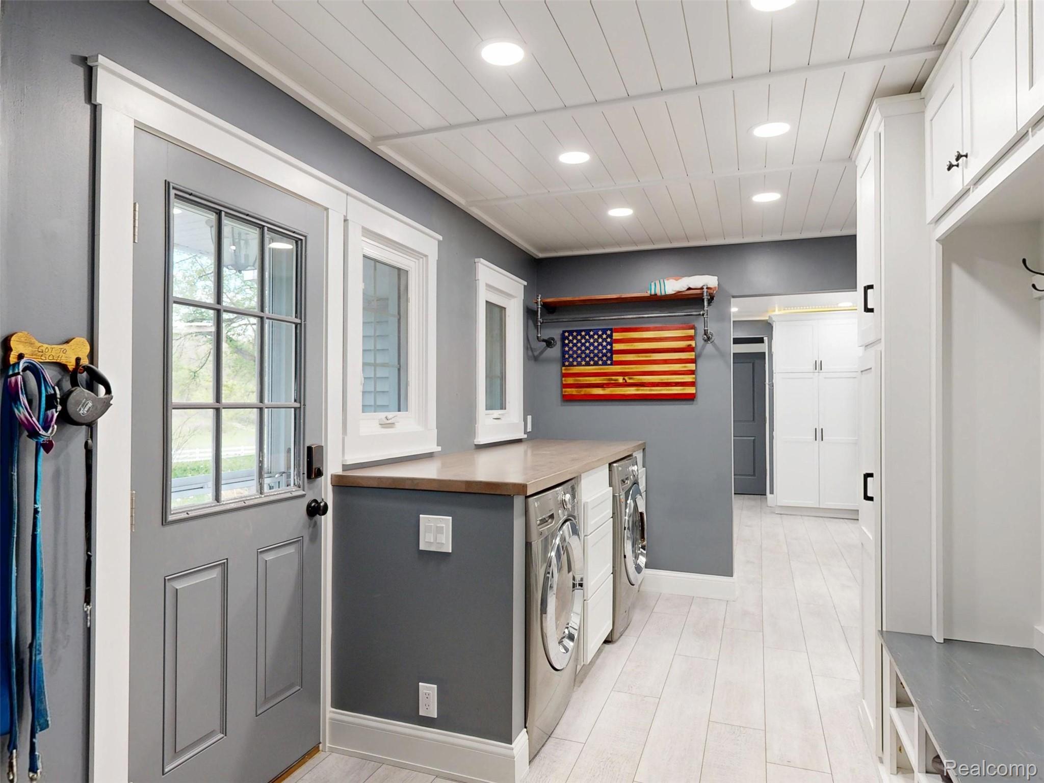 10300 Clark Road Davisburg, MI 48350 - Photo 25 of 39 Laundry room with independent washer and dryer and recessed lighting