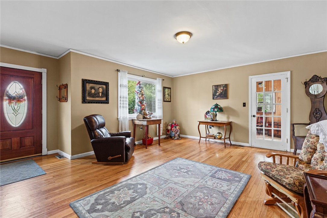 2028 Moultrie Square Anderson, SC 29621 - Photo 7 of 30 Gleaming hardwood floors and classic wood-trimmed entryways anchor this inviting main living area.