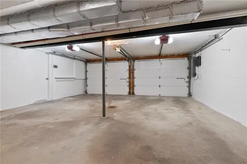 a view of a backyard with sitting area