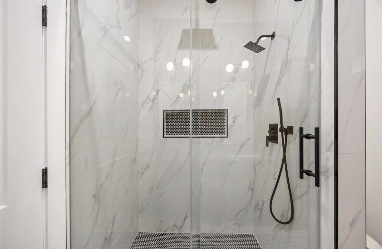 8011 Cora Street, Unit A Houston, TX 77088 - Photo 11 of 14 a bathroom with a shower