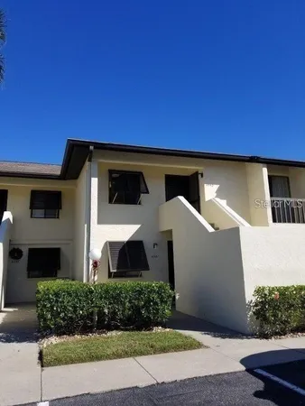 a view of a back yard of the house