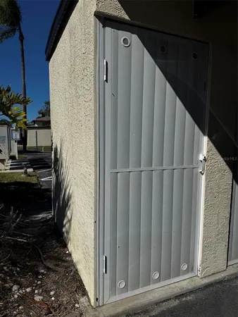 a kitchen with granite countertop a refrigerator and a stove
