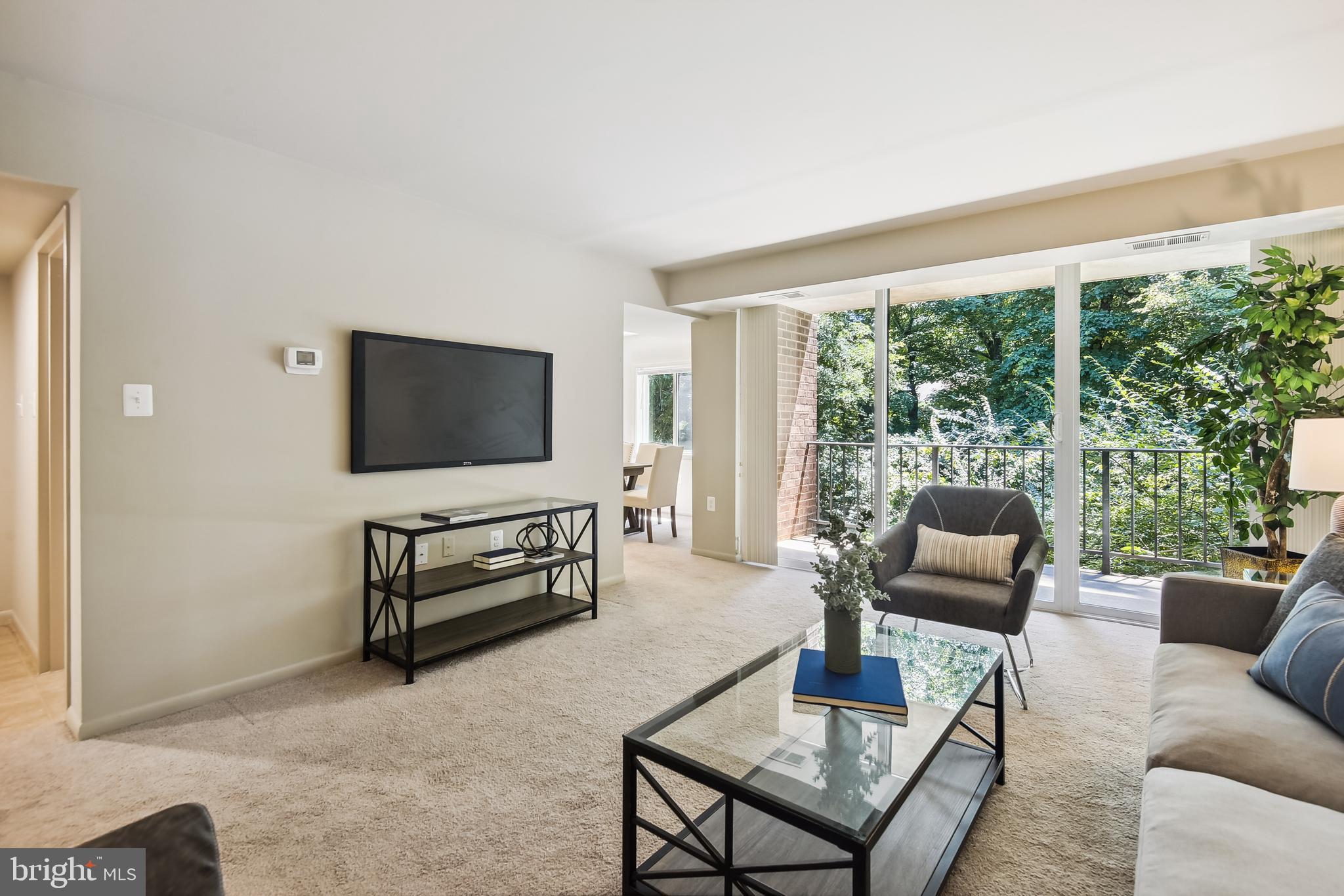 1416 Northgate Square, Unit 12B Reston, VA 20190 - Photo 3 of 23 Sunny, Spacious Living Room