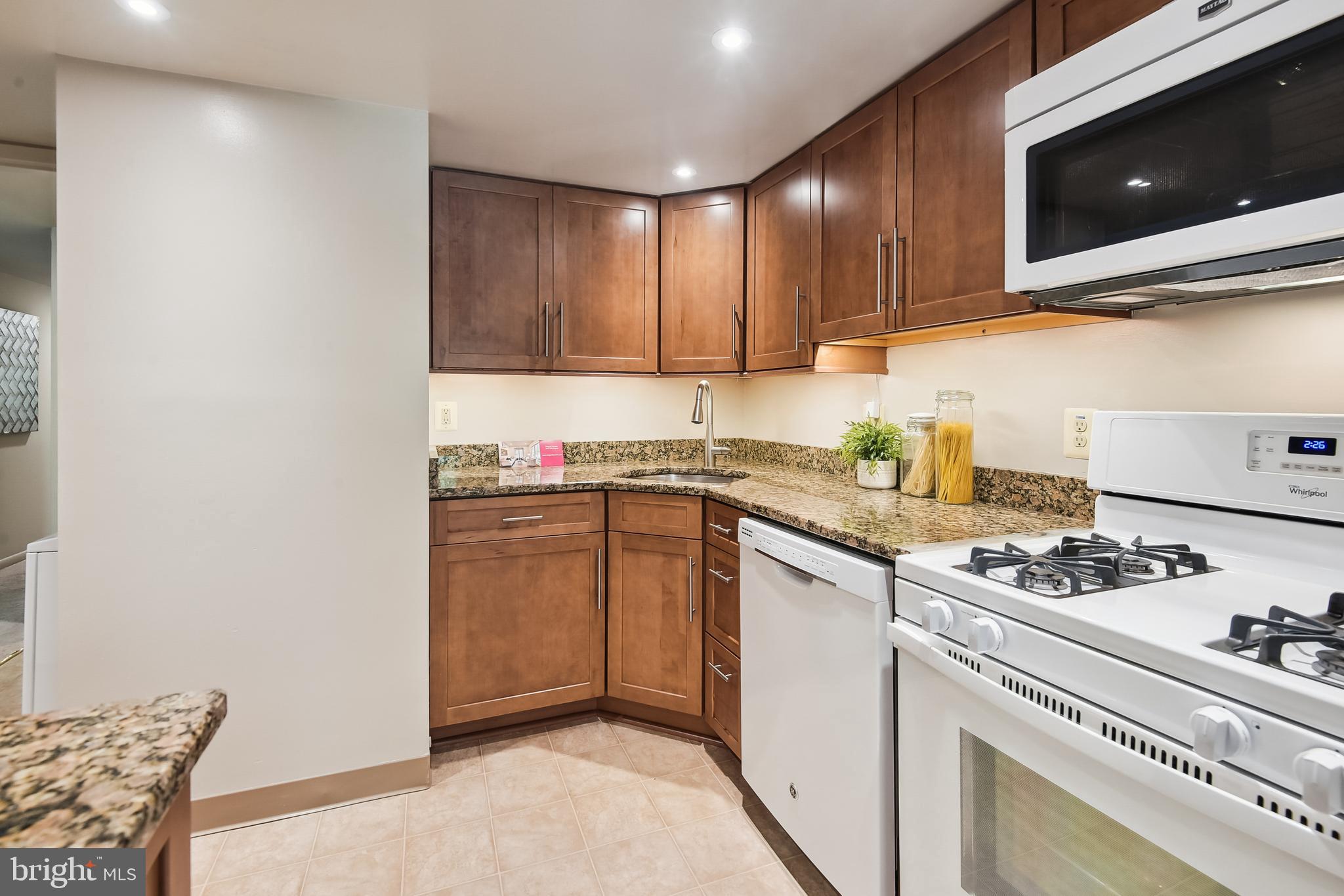 1416 Northgate Square, Unit 12B Reston, VA 20190 - Photo 9 of 23 Beautiful and Efficient Kitchen