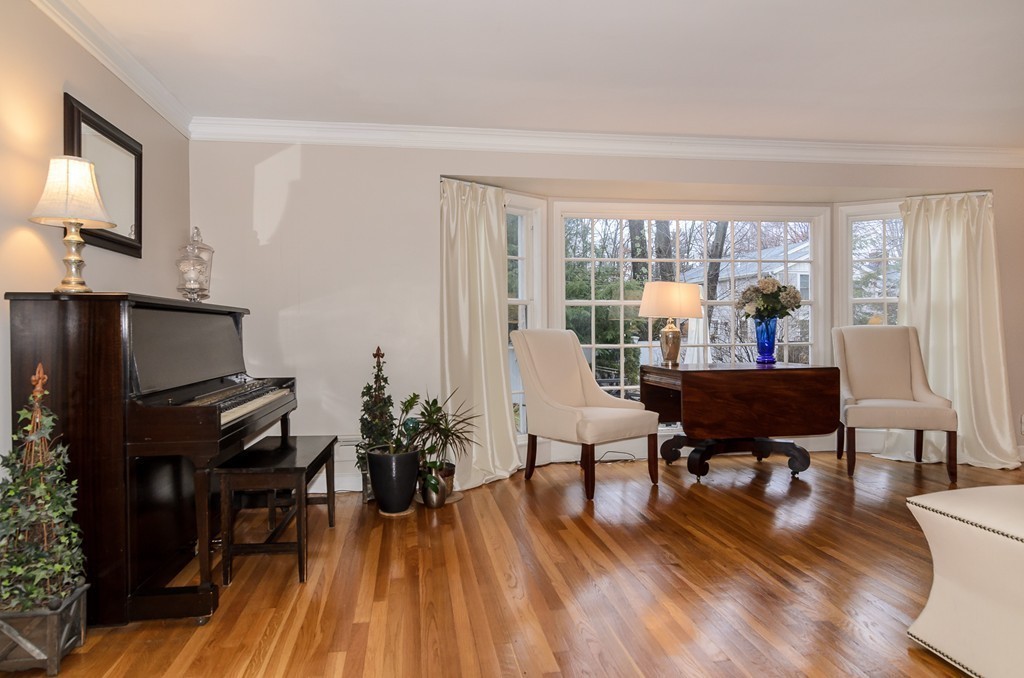 39 Rutgers Road Wellesley, MA 02481 - Photo 6 of 21 a living room with furniture fireplace and wooden floor