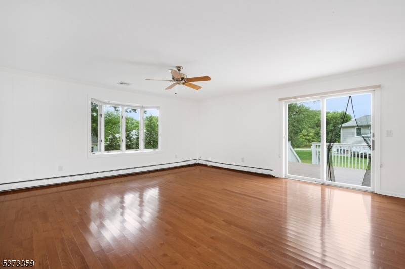 1 Baldwin Road Florham Park, NJ 07932 - Photo 17 of 33 a view of a livingroom with wooden floor and a window