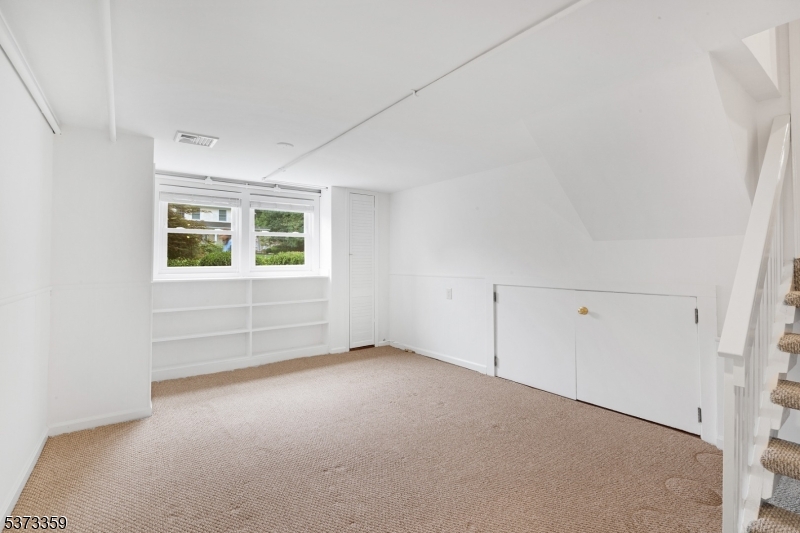 1 Baldwin Road Florham Park, NJ 07932 - Photo 24 of 33 an empty room with a empty space and windows