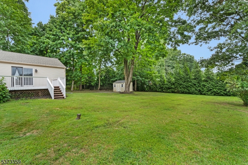 1 Baldwin Road Florham Park, NJ 07932 - Photo 30 of 33 a view of a backyard with a garden