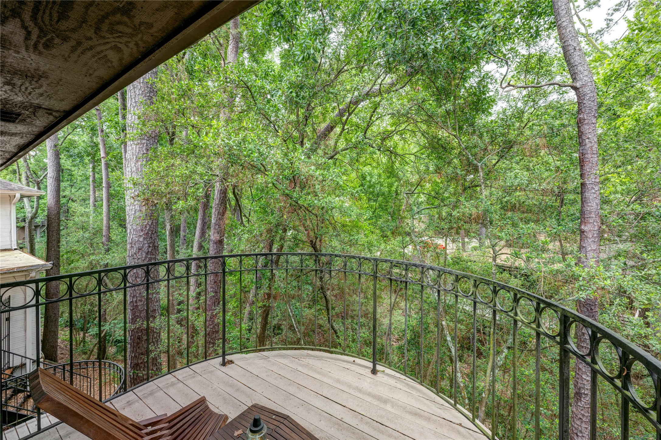 201 Vanderpool Lane, Unit 130 Houston, TX 77024 - Photo 23 of 41 Upon setting foot on the balcony, one has the sense of being perched within the adjacent tree canopy.
