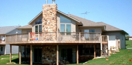 942 Lake Summerset Road Lake Summerset, IL 61019 - Photo 1 of 6 a view of a house with a balcony and yard