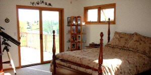 942 Lake Summerset Road Lake Summerset, IL 61019 - Photo 3 of 6 a bed sitting in a bedroom next to a window