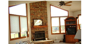 942 Lake Summerset Road Lake Summerset, IL 61019 - Photo 6 of 6 a living room with fireplace windows and a flat screen tv