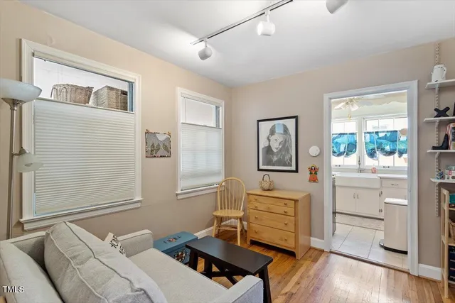 a living room with furniture and window
