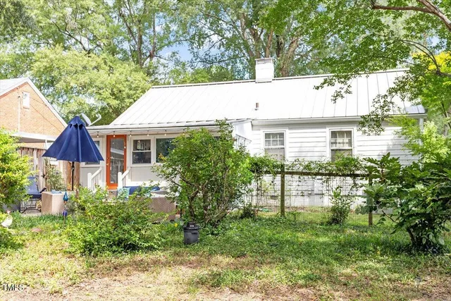 a house view with a garden space