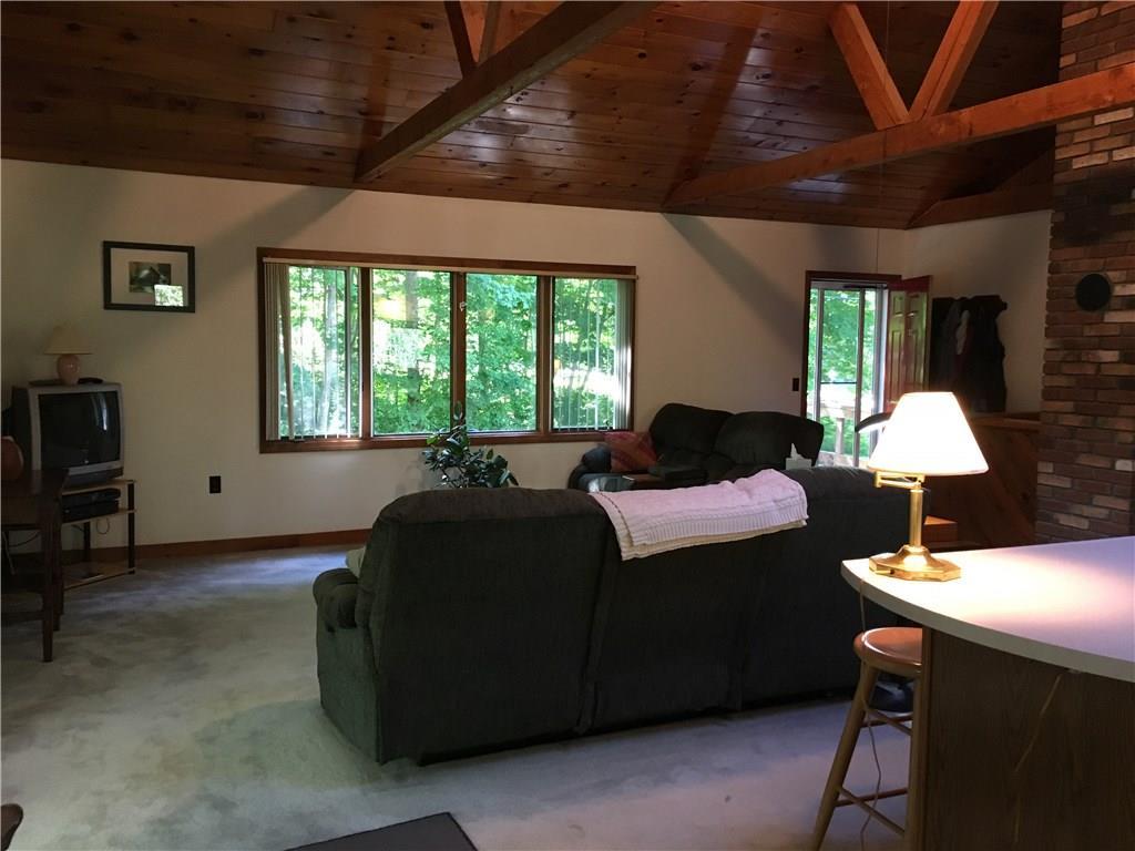 95 Morrill Road Belmont, ME 04952 - Photo 13 of 28 View of the living room with the...