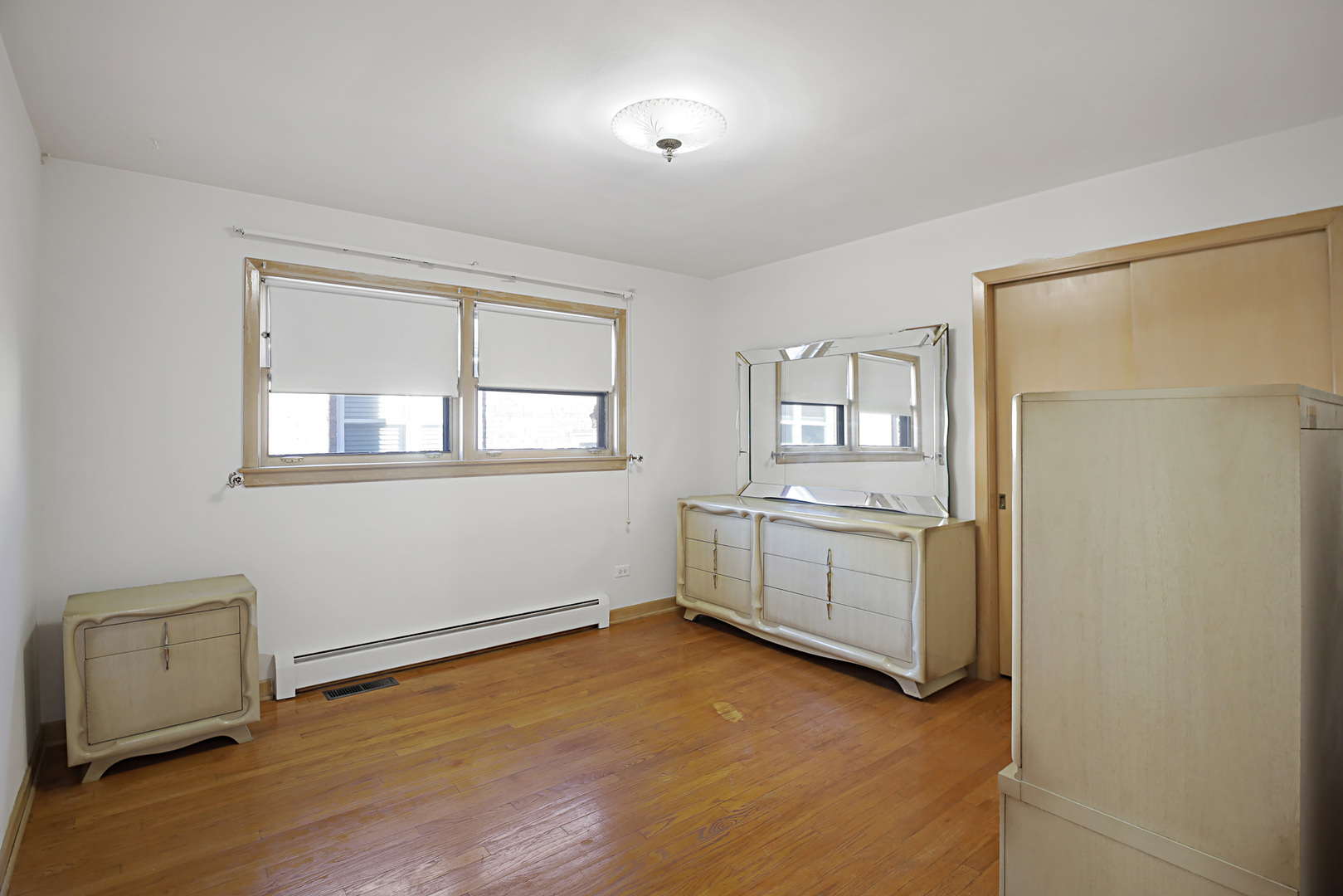 4941 North Normandy Avenue Chicago, IL 60656 - Photo 13 of 35 a view of a room with window and wooden floor