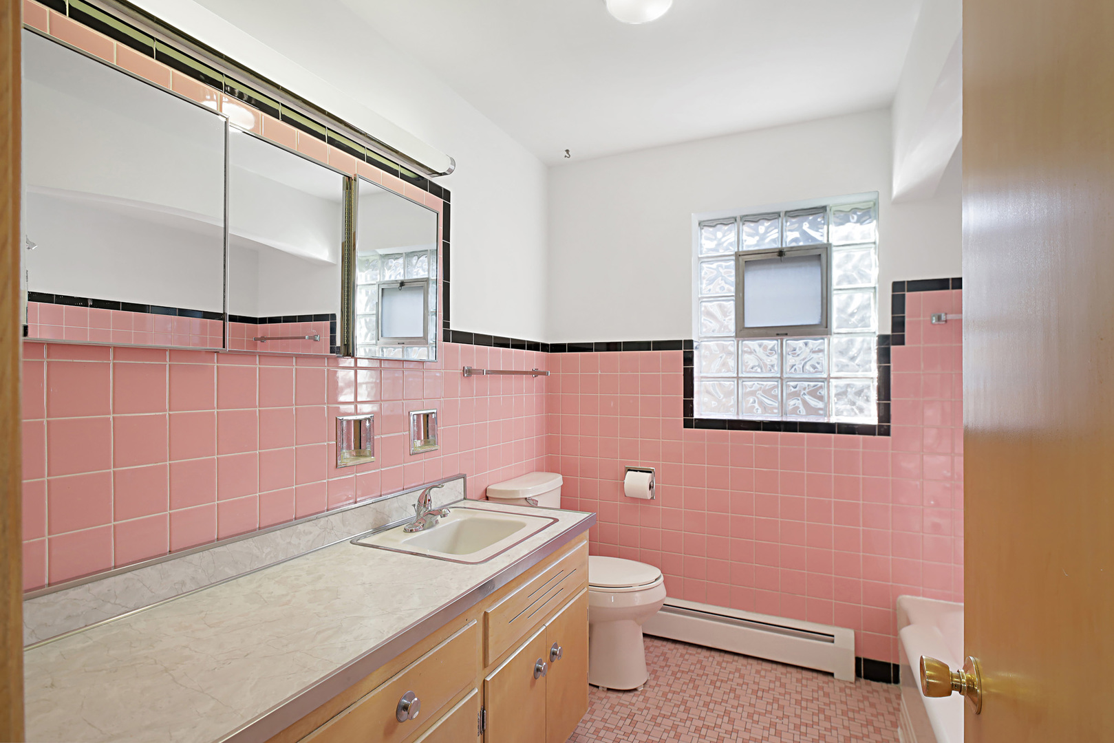 4941 North Normandy Avenue Chicago, IL 60656 - Photo 15 of 35 a bathroom with a granite countertop sink toilet and shower