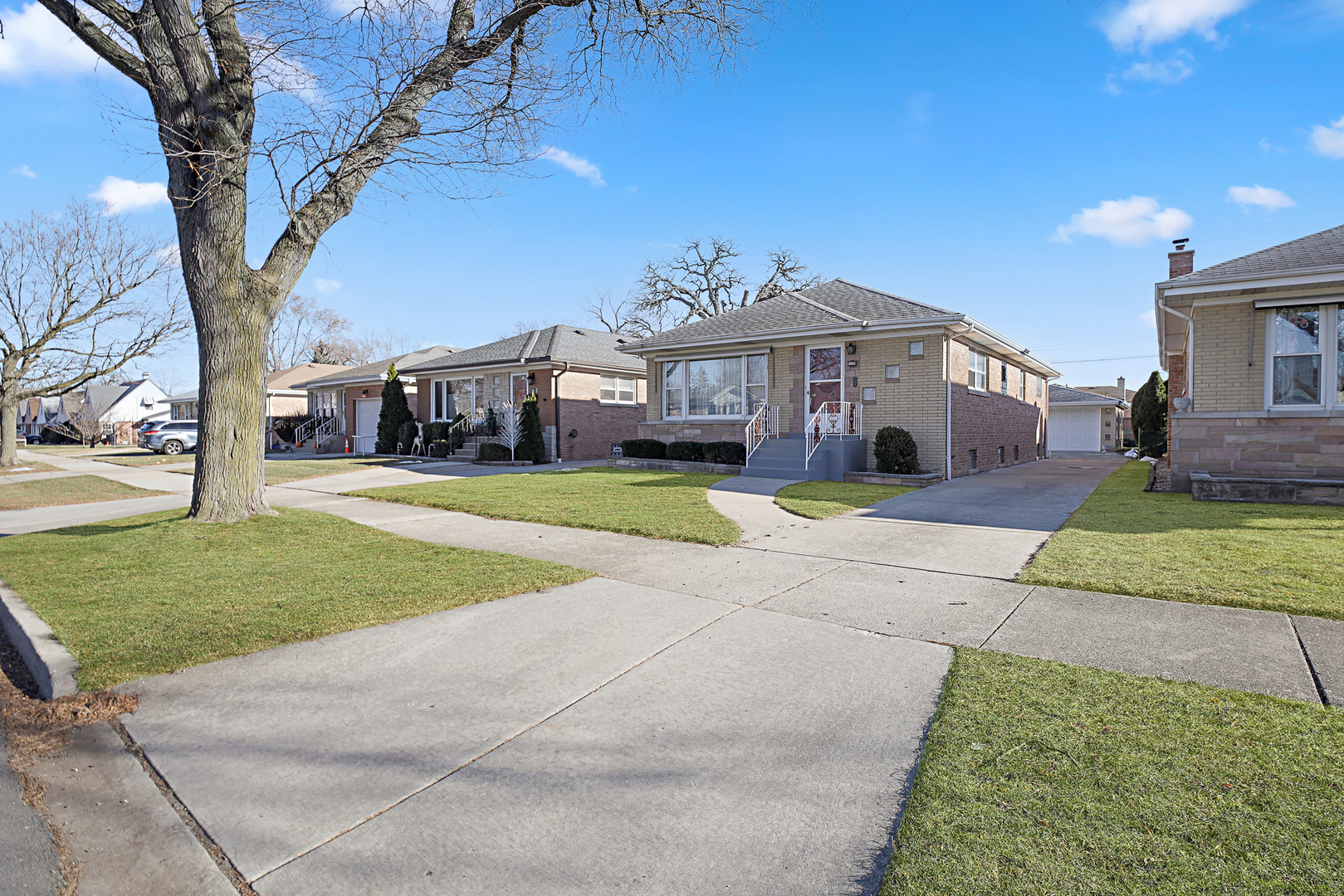 4941 North Normandy Avenue Chicago, IL 60656 - Photo 4 of 35 a view of a house with a yard