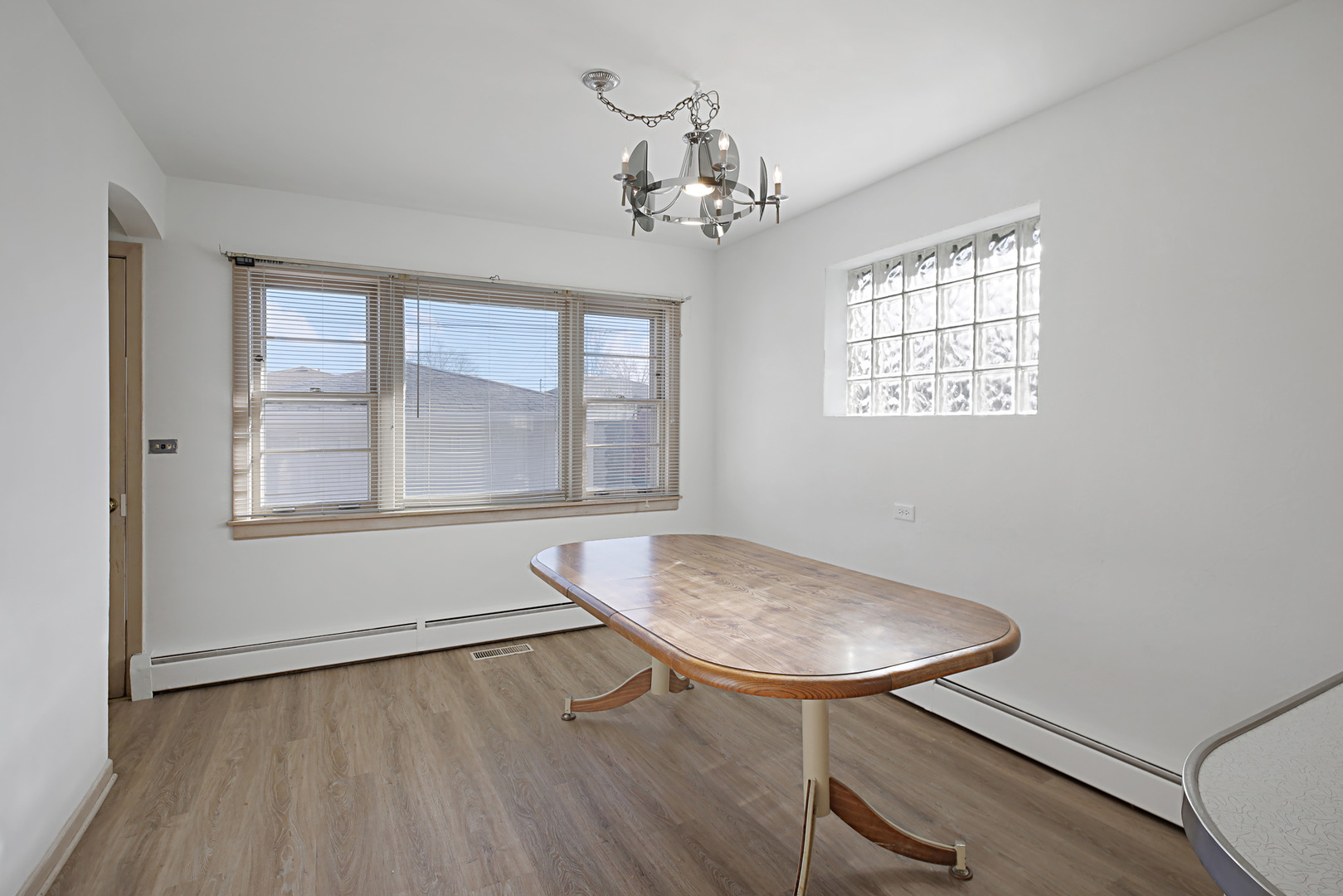4941 North Normandy Avenue Chicago, IL 60656 - Photo 8 of 35 a view of a room with furniture window and wooden floor