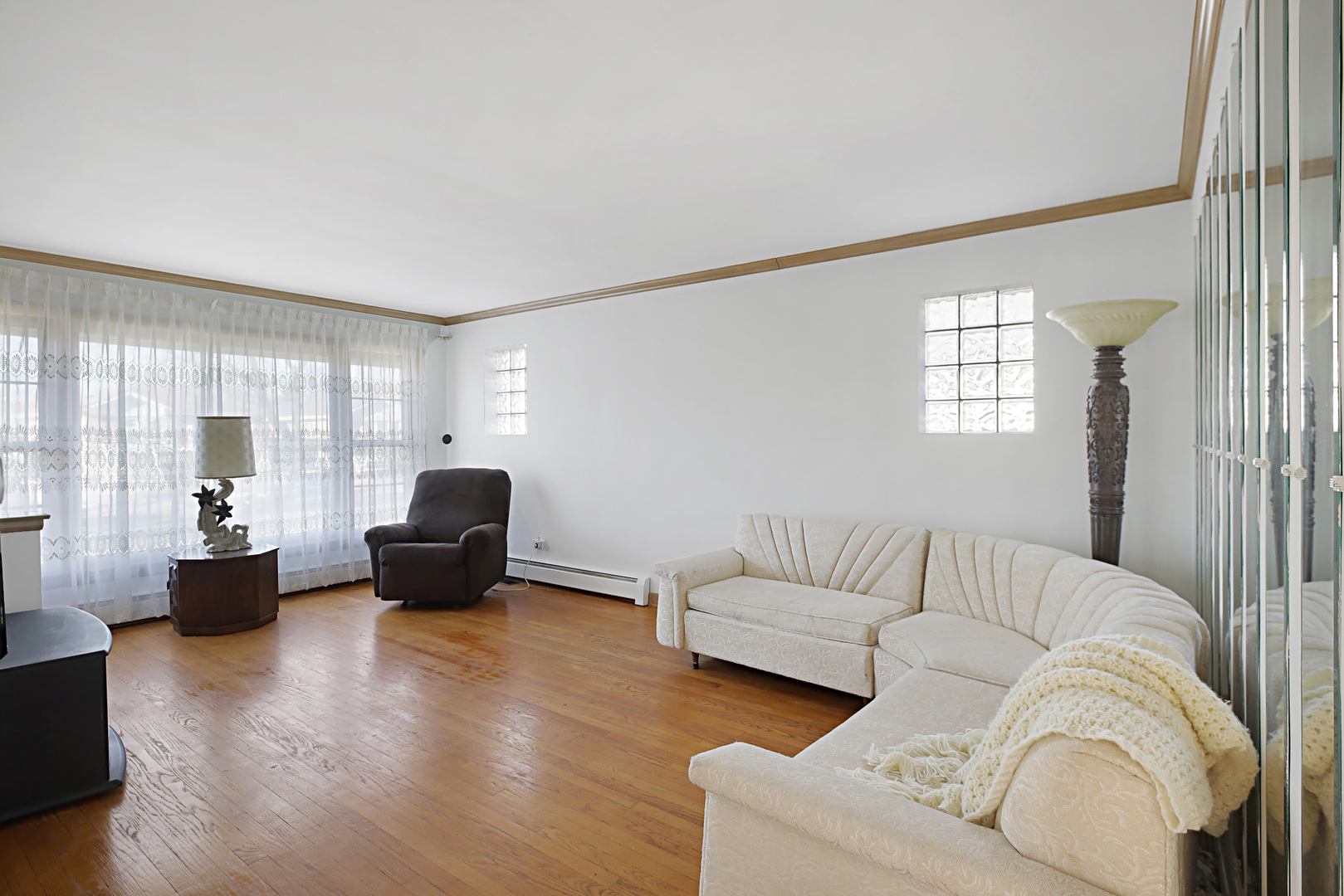 4941 North Normandy Avenue Chicago, IL 60656 - Photo 9 of 35 a living room with furniture or couch and a window