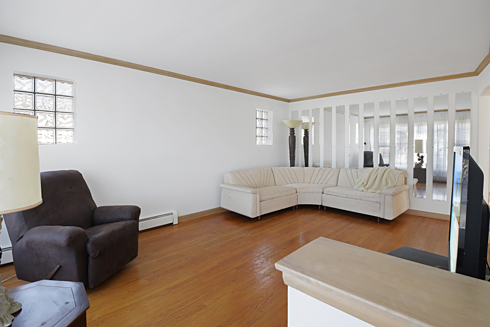 4941 North Normandy Avenue Chicago, IL 60656 - Photo 10 of 35 a living room with furniture and a large window