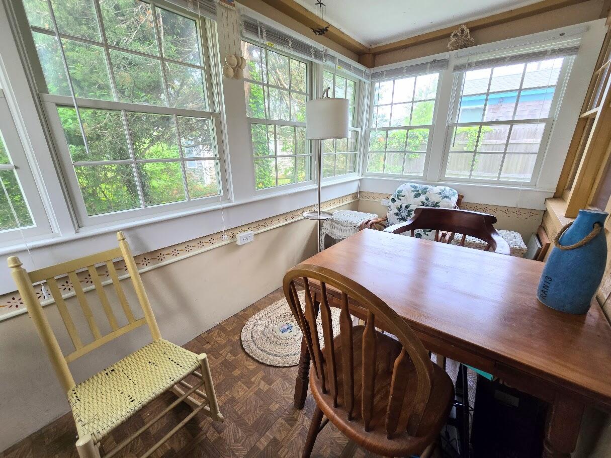 18 Myrtle Lane Dennis Port, MA 02639 - Photo 6 of 25 a view of a dining room with furniture window and outside view