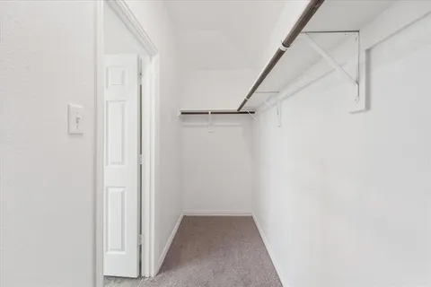 a view of hallway with white walls