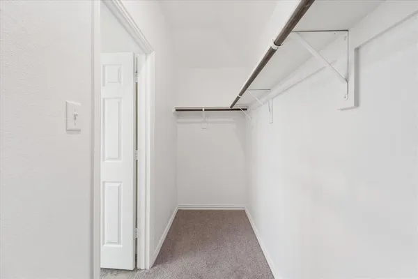 a view of hallway with white walls