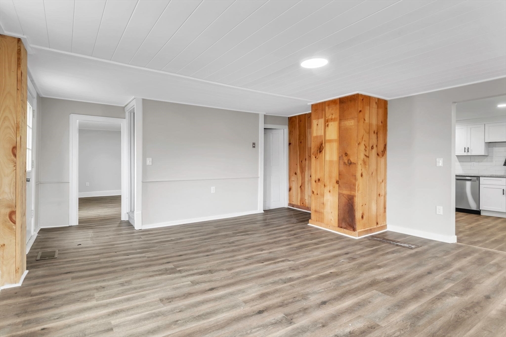 140 Greenwich Plains Road Ware, MA 01082 - Photo 20 of 42 a view of an empty room with wooden floor and closet